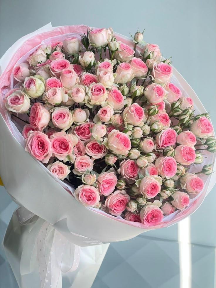 Professional floral arrangement in modern corporate setting